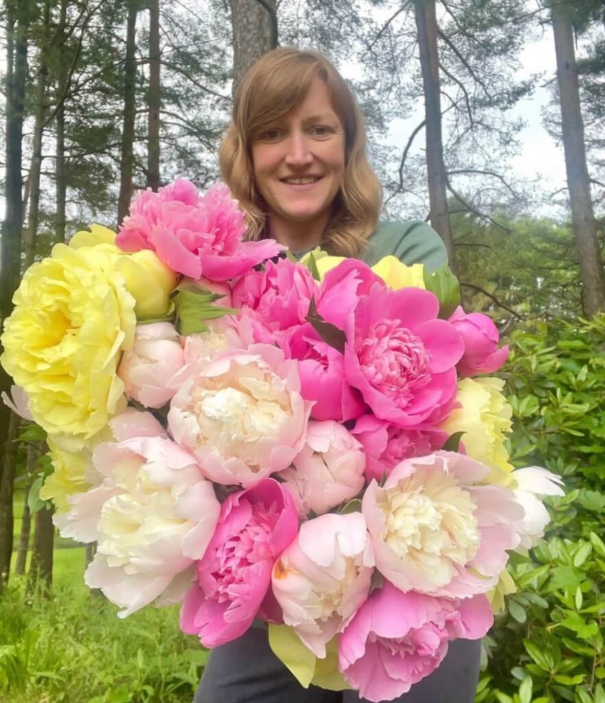 woman holding flower bouquet