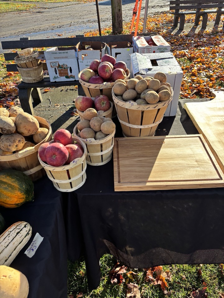 Potatoes and cutting boards at market