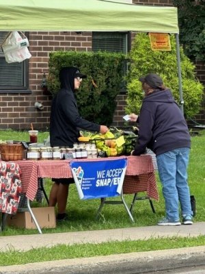 people at stand